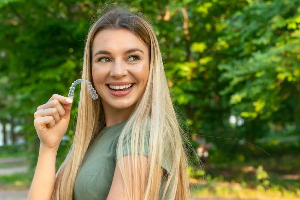 woman with Invisalign Brookhaven